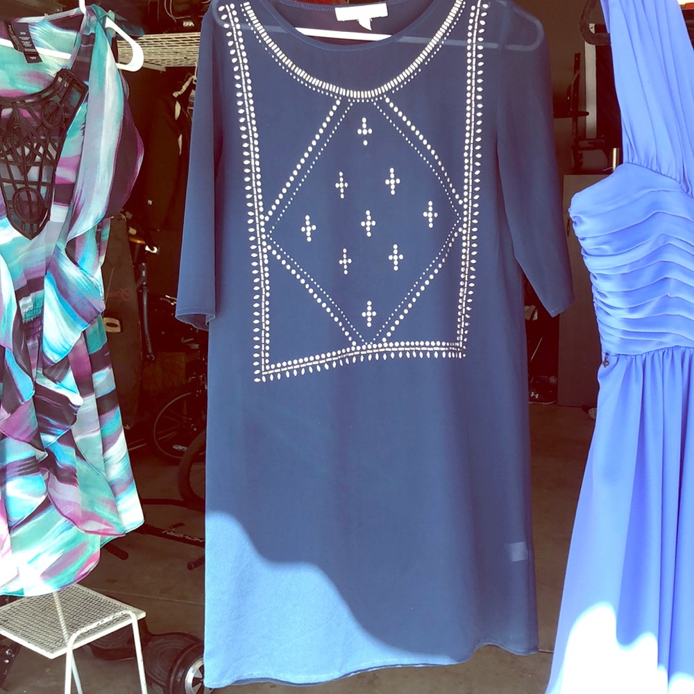 Sheer turquoise tunic with gold detail